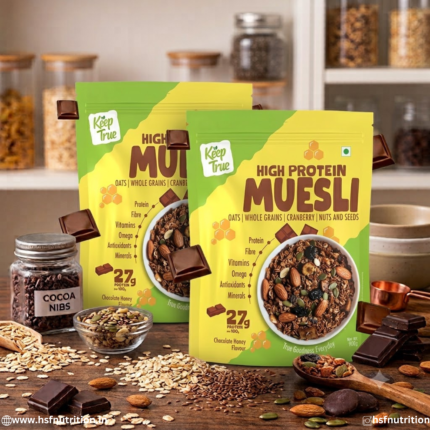 Untitled (1080 x 1080 px) (7).jpg - Keeptrue High Protein Muesli 900g Chocolate Honey flavor pouches with whole grains, chocolate elements, and nuts scattered across a wooden table
